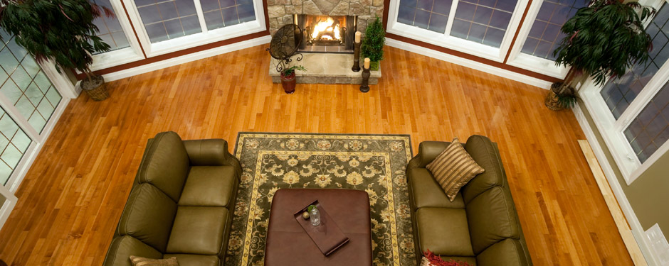 Aerial view of living room with hardwood floors