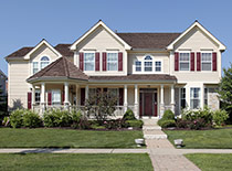 home exterior with siding and red shuttles