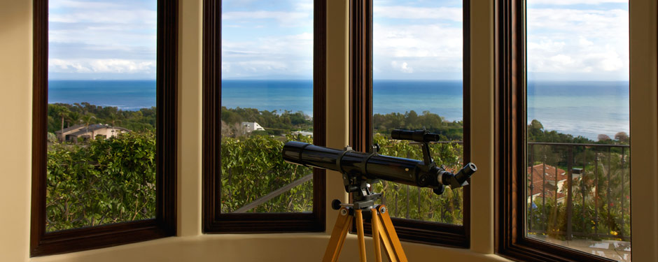 Ocean view windows with telescope