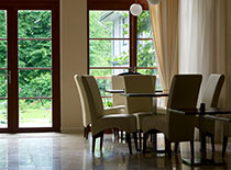 dining room with glass doors and hardwood