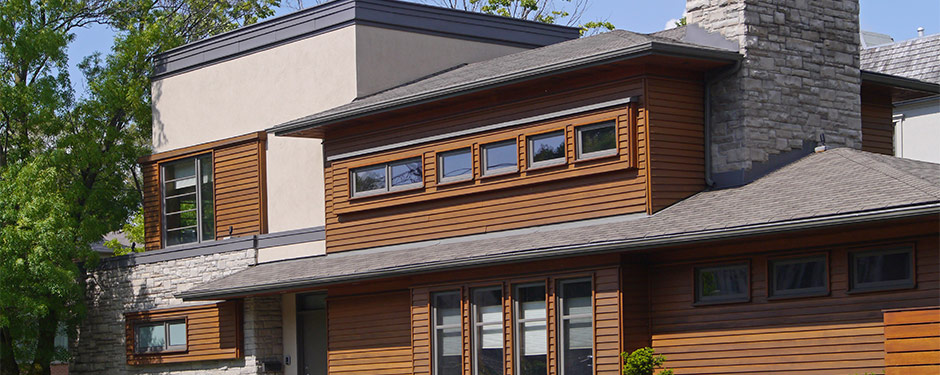 Modern house with wood and brick siding