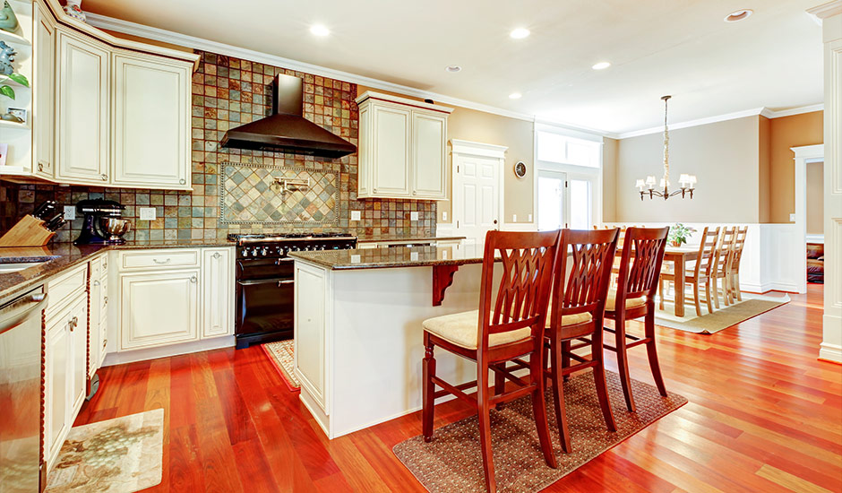 kitchen remodel with hardwood floors and tiled backsplash