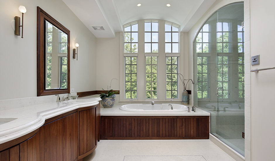 white bathroom with wood paneling