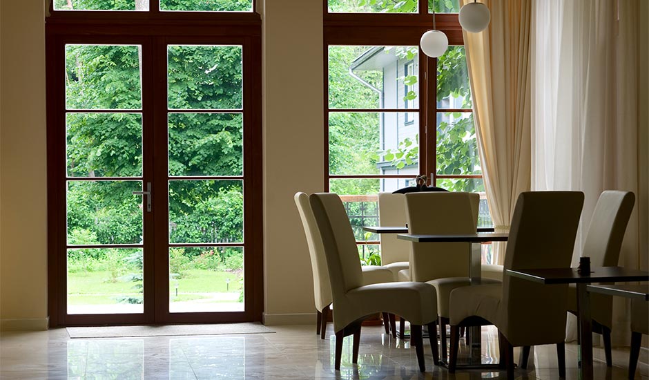 dining room with large windows