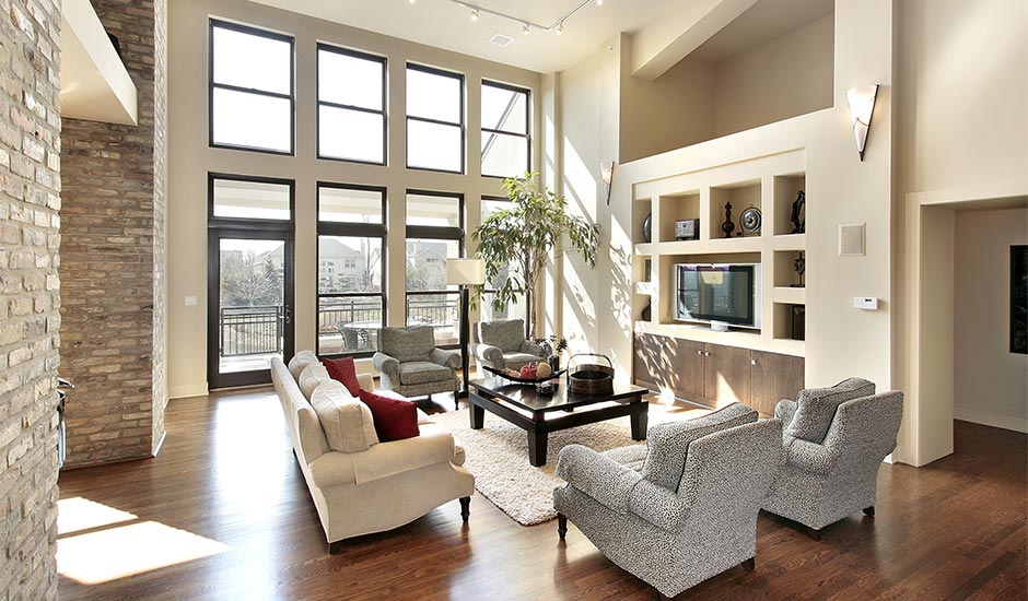 tall modern living room with large windows