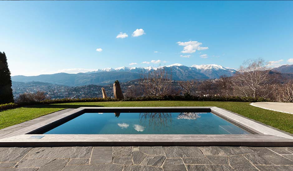glassy pool with mountain view