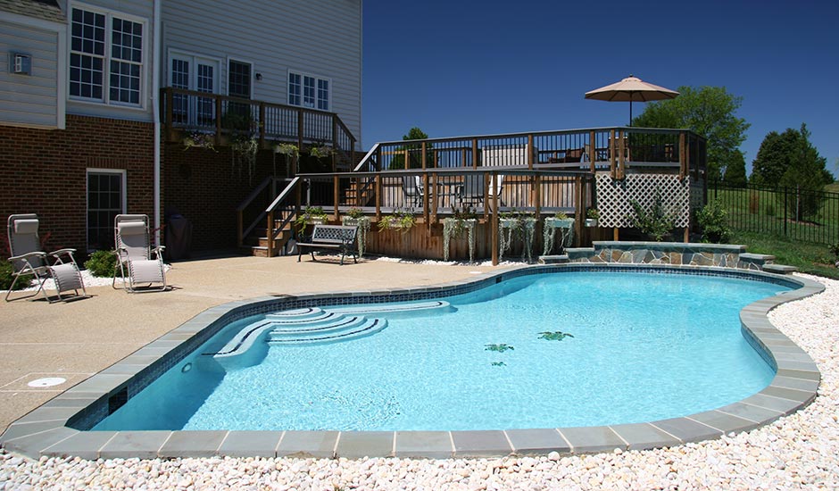 backyard turtle pool with large deck patio