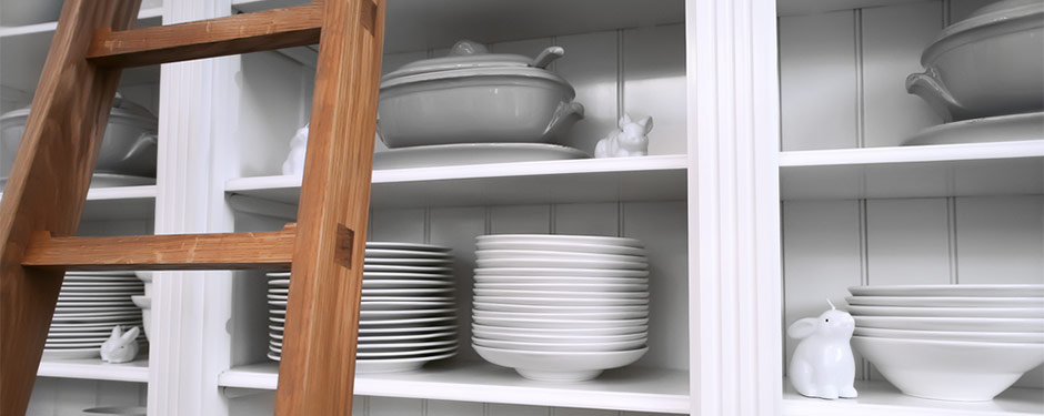 open kitchen shelves with white dishes