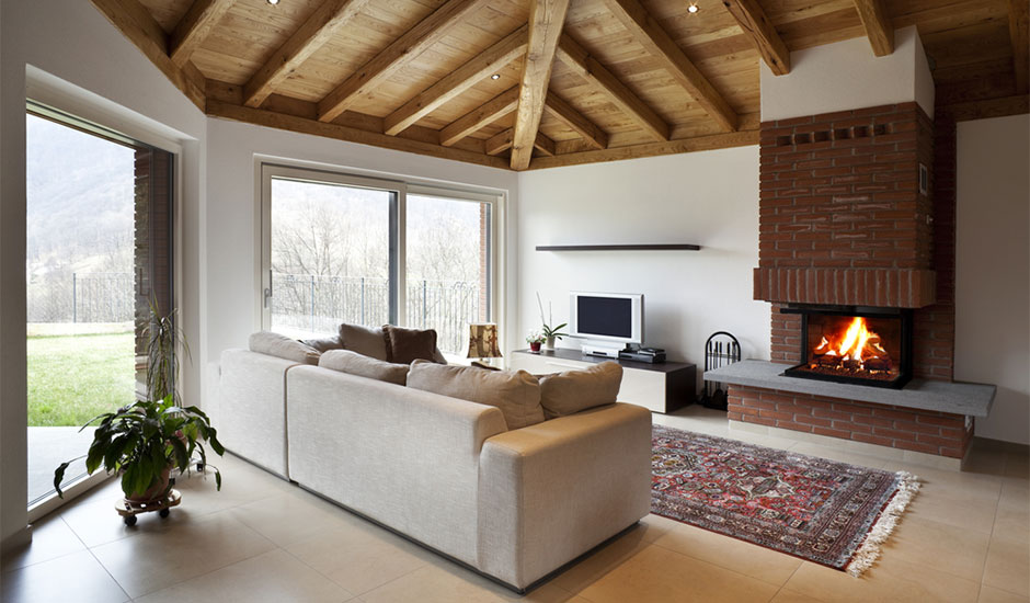 living room with fireplace and lofted ceilings
